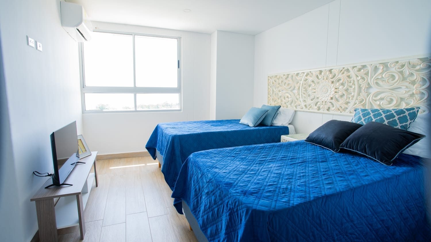 Segunda habitación con dos camas dobles — OCEANI05